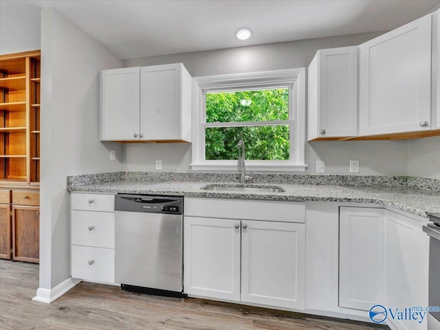2612 Valley Brook Dr, Huntsville, AL 35811 - kitchen with stainless steel dishwasher, white cabinetry, light wood-style floors, and light stone countertops