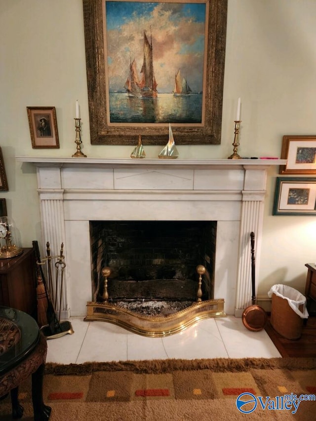 interior details featuring a fireplace