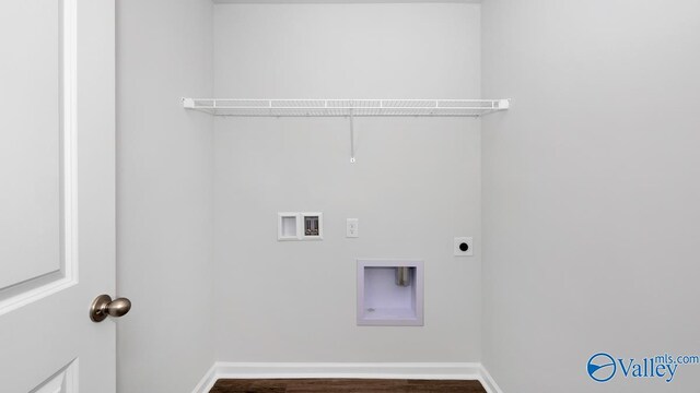 laundry room featuring laundry area, baseboards, wood finished floors, hookup for a washing machine, and electric dryer hookup