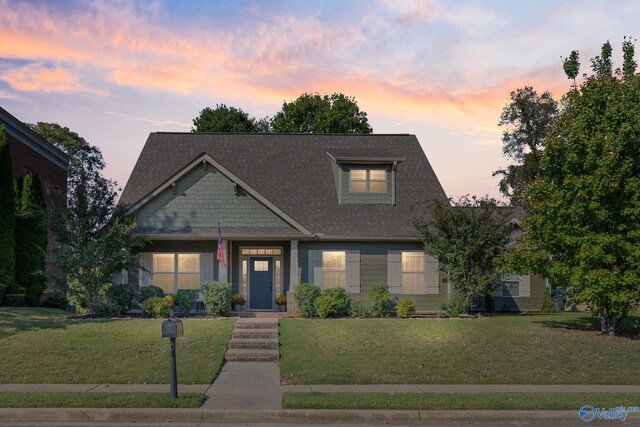 view of front of home with a front yard