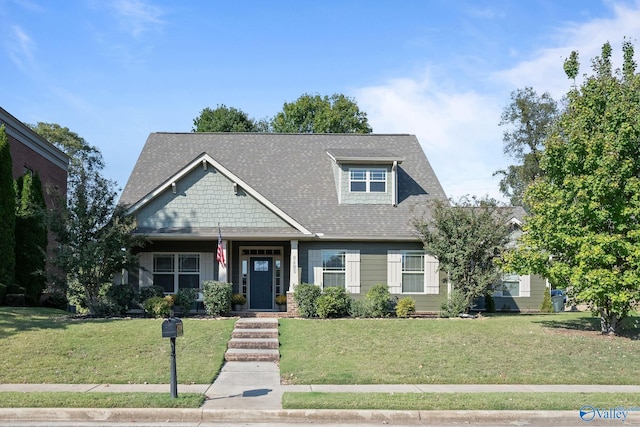 craftsman-style house featuring a front lawn