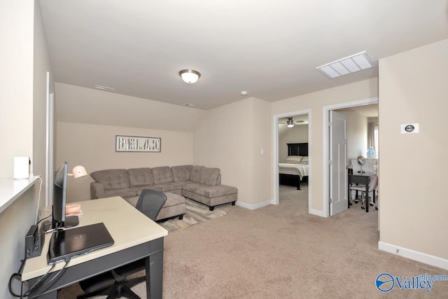 living room featuring light colored carpet