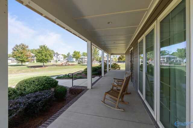 view of exterior entry with ceiling fan