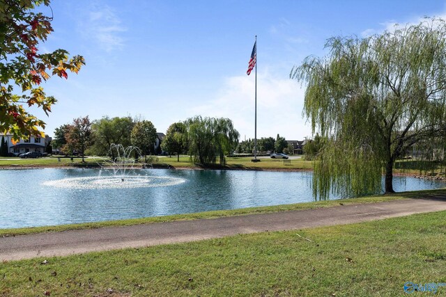 view of swimming pool featuring a patio area and pool water feature