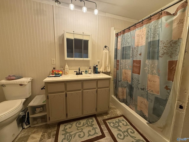 bathroom featuring vanity, wooden walls, toilet, and a shower with shower curtain