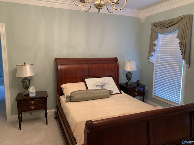 carpeted bedroom featuring a chandelier, crown molding, and baseboards