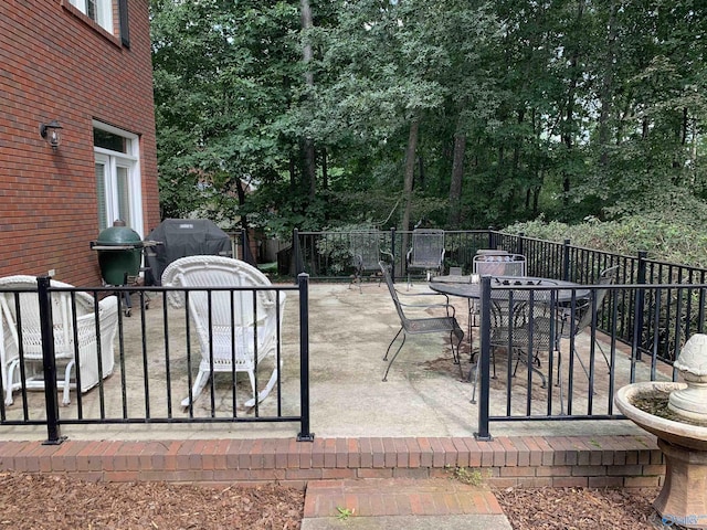 view of patio / terrace with outdoor dining area and area for grilling