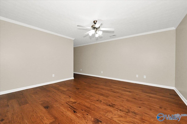 spare room with wood finished floors, a ceiling fan, baseboards, and crown molding