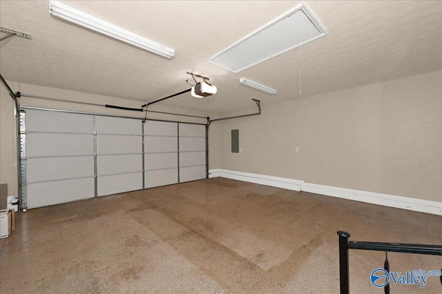 garage with electric panel, baseboards, and a garage door opener