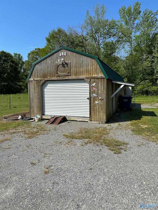 view of outbuilding with a garage