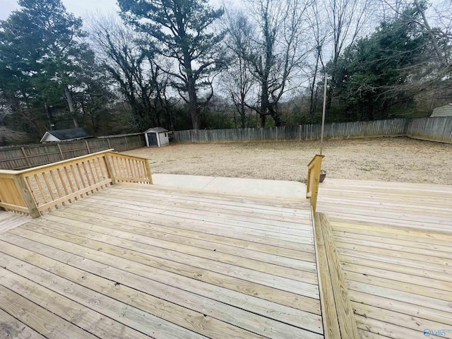 wooden deck with a shed