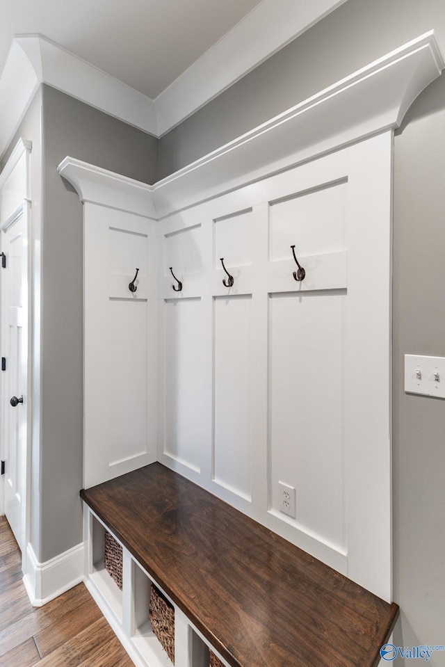 mudroom with wood finished floors