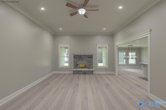 unfurnished living room featuring ceiling fan, light hardwood / wood-style flooring, ornamental molding, and a stone fireplace