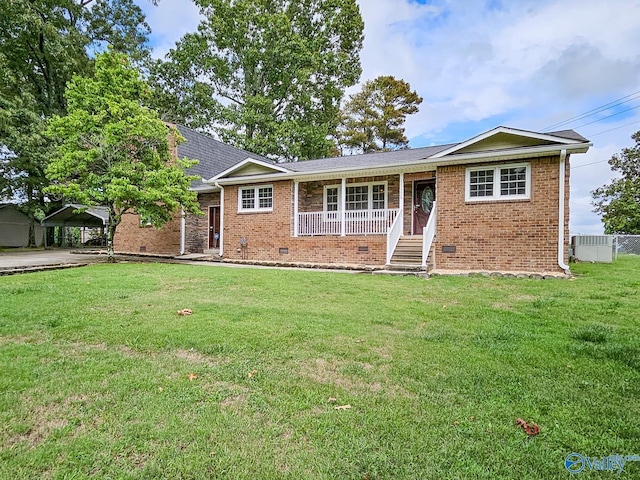 ranch-style home with a front yard, crawl space, and brick siding