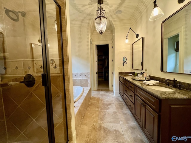 bathroom featuring a chandelier, vanity, separate shower and tub, and crown molding