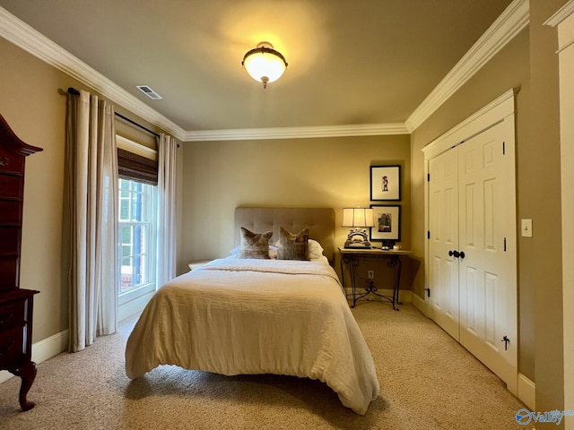 carpeted bedroom featuring crown molding