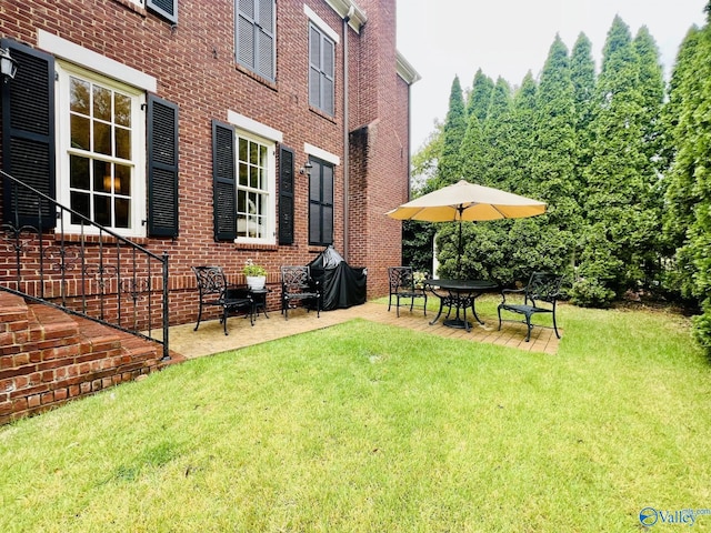 view of yard with a patio area