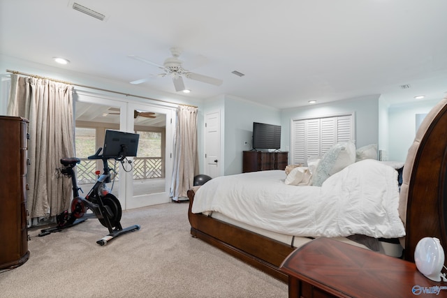 carpeted bedroom with ceiling fan, crown molding, access to outside, and french doors