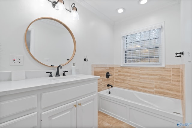 bathroom featuring tile patterned flooring, vanity, crown molding, and a tub