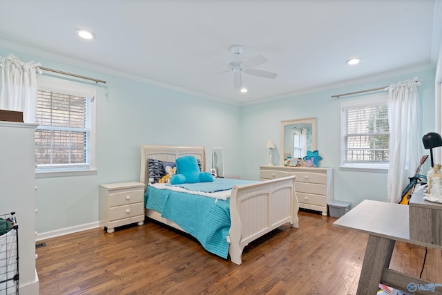 bedroom featuring dark hardwood / wood-style floors, ceiling fan, and ornamental molding