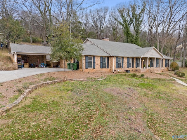 ranch-style house with a front lawn