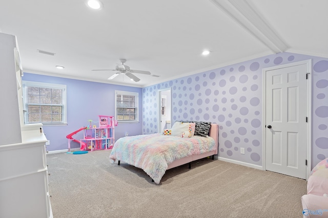 bedroom featuring ceiling fan, carpet, and ornamental molding