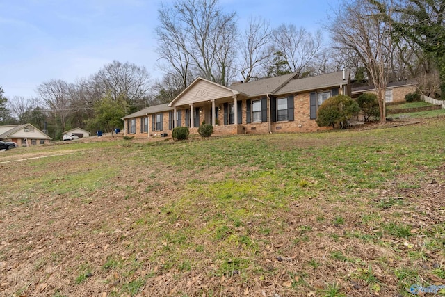 single story home with a front lawn