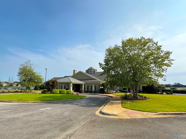 view of front of home with a front lawn