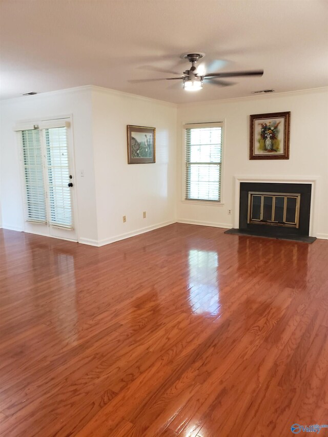 unfurnished bedroom with ensuite bathroom, light carpet, and a textured ceiling