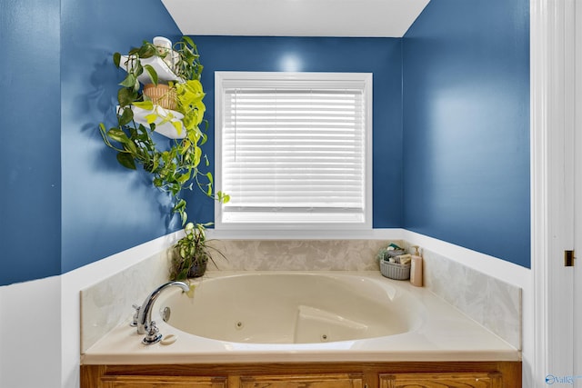 bathroom with a jetted tub