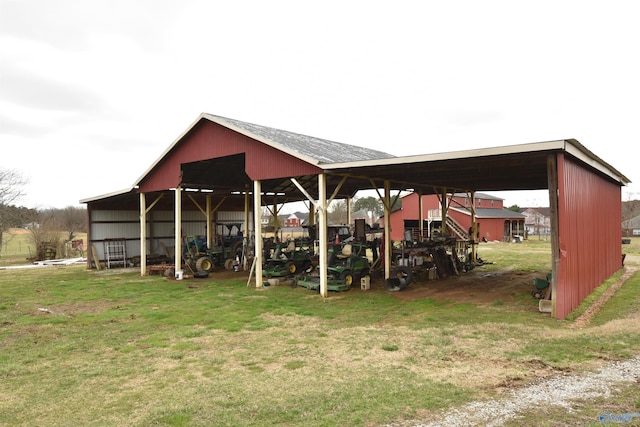 view of outdoor structure featuring a lawn