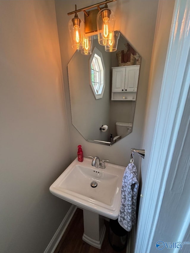 103 Covey Ln, Hazel Green, AL 35750 - bathroom featuring a chandelier and a sink