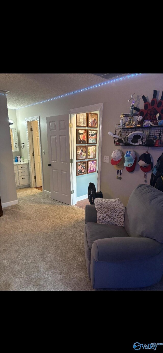 103 Covey Ln, Hazel Green, AL 35750 - living room with carpet and baseboards