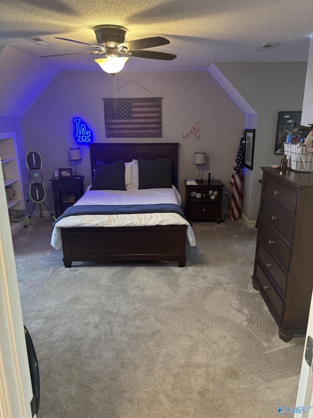 103 Covey Ln, Hazel Green, AL 35750 - bedroom with vaulted ceiling, light carpet, a textured ceiling, and a ceiling fan