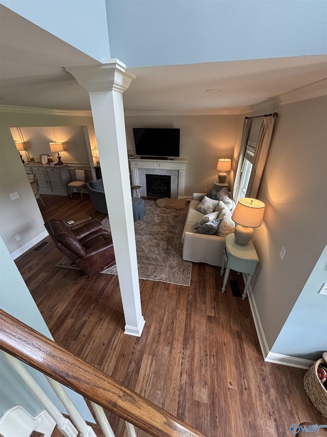 103 Covey Ln, Hazel Green, AL 35750 - living area featuring crown molding, a fireplace, wood finished floors, and decorative columns
