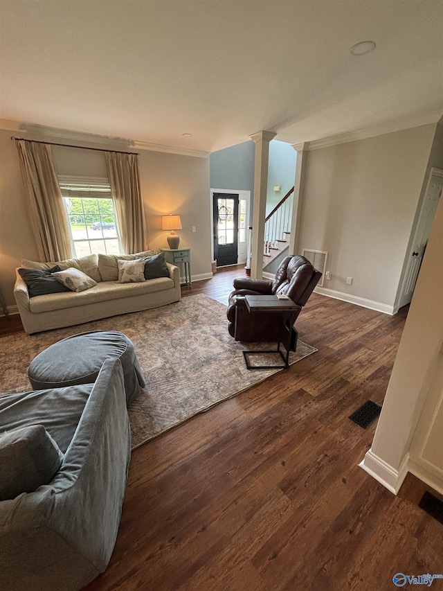 103 Covey Ln, Hazel Green, AL 35750 - living room featuring ornamental molding, plenty of natural light, dark wood finished floors, stairway, and ornate columns