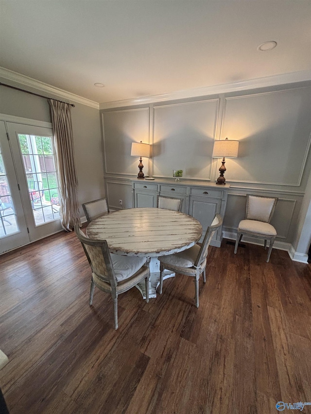 103 Covey Ln, Hazel Green, AL 35750 - dining room featuring dark wood-type flooring, crown molding, and a decorative wall