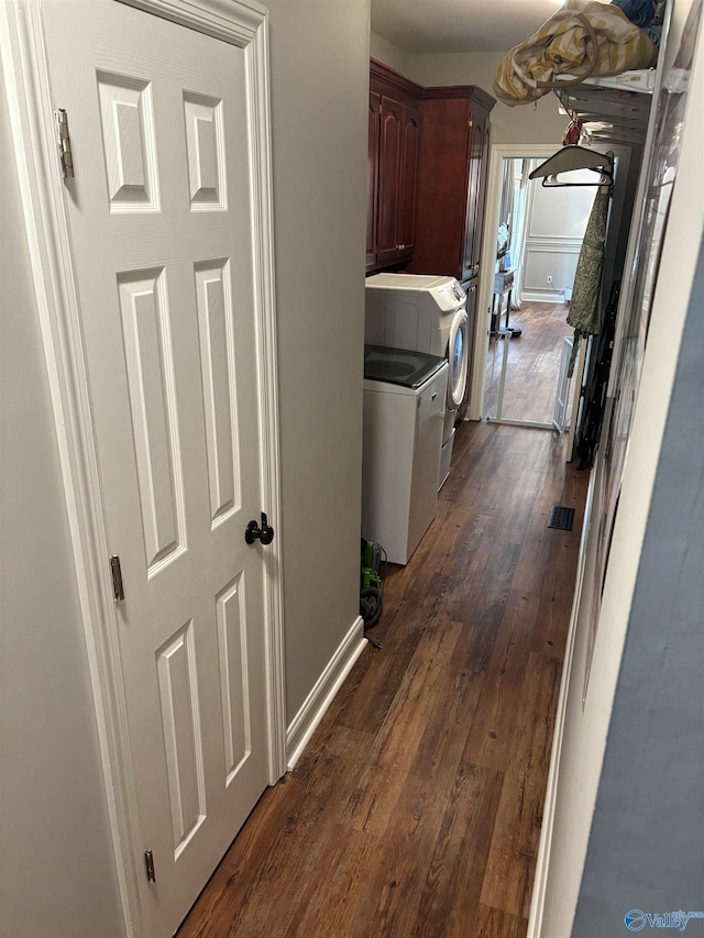 103 Covey Ln, Hazel Green, AL 35750 - laundry room featuring cabinet space, washer and dryer, and dark wood finished floors