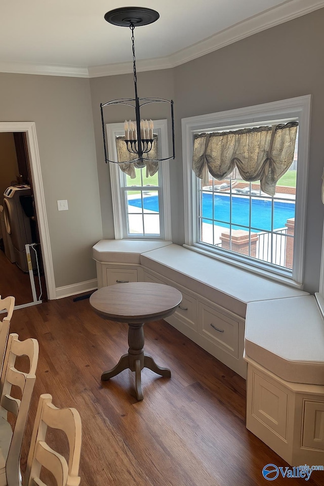 103 Covey Ln, Hazel Green, AL 35750 - dining space with a chandelier, dark wood-style floors, and ornamental molding