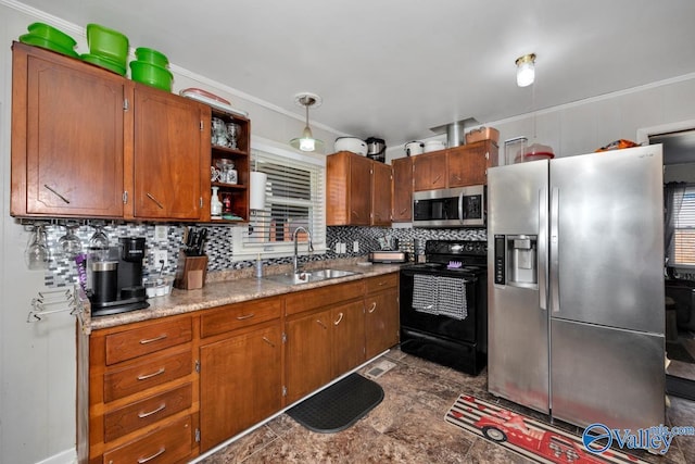 kitchen featuring appliances with stainless steel finishes, pendant lighting, tasteful backsplash, and sink