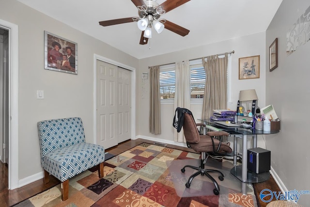 office area with ceiling fan and hardwood / wood-style flooring