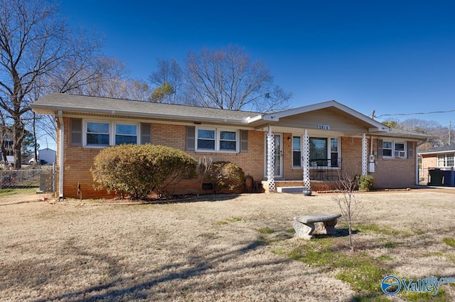 ranch-style home featuring a porch