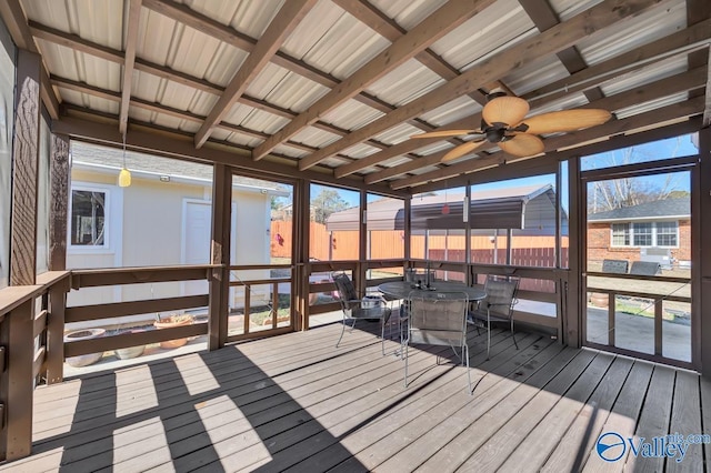 wooden terrace featuring ceiling fan