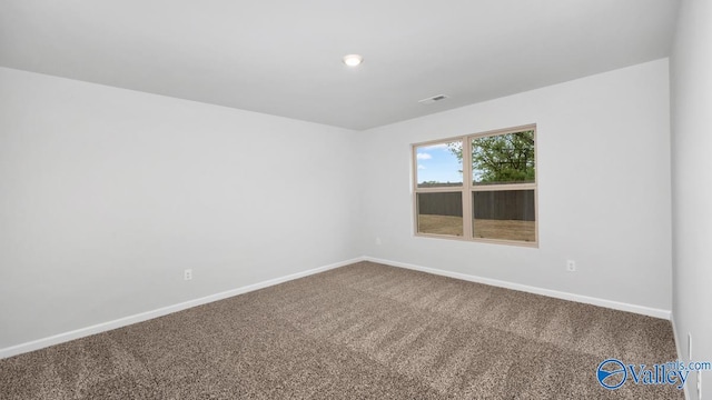 view of carpeted spare room