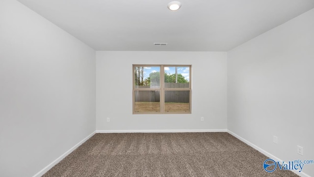 empty room featuring carpet floors