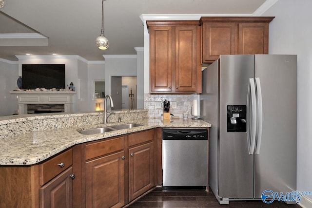 2906 Pasture View Ln, Owens Cross Roads, AL 35763 - kitchen featuring stainless steel appliances, crown molding, light stone countertops, brown cabinets, and open floor plan