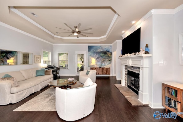 2906 Pasture View Ln, Owens Cross Roads, AL 35763 - living area with a raised ceiling, ceiling fan, wood finished floors, a fireplace, and crown molding