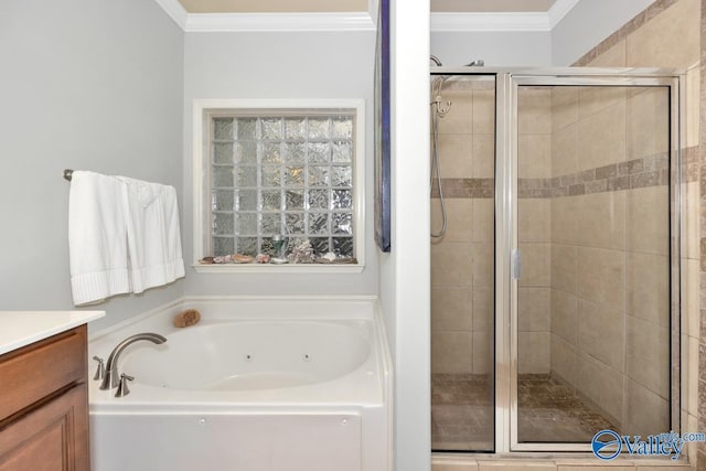 2906 Pasture View Ln, Owens Cross Roads, AL 35763 - bathroom featuring a tub with jets, a stall shower, ornamental molding, and vanity