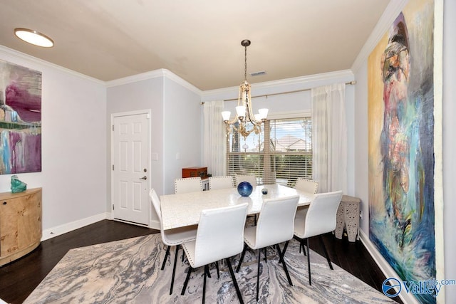 2906 Pasture View Ln, Owens Cross Roads, AL 35763 - dining space featuring a chandelier, dark wood-style floors, and crown molding