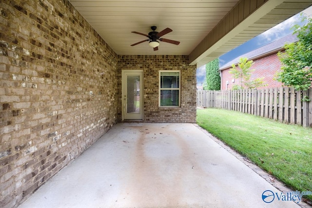 2906 Pasture View Ln, Owens Cross Roads, AL 35763 - fenced backyard featuring ceiling fan and a patio